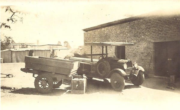 Gervas Hughes Two Ton Truck parked outside his office and workshop on First Street, Que Que 1928.
