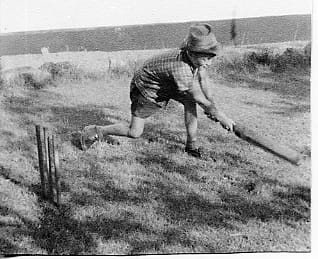 My brother David getting back yard cricket coaching